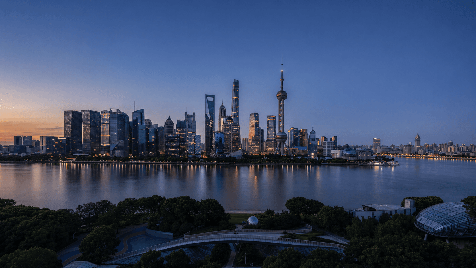 Shanghai skyline at dusk — Pudong from the Bund, Hello China relocation services